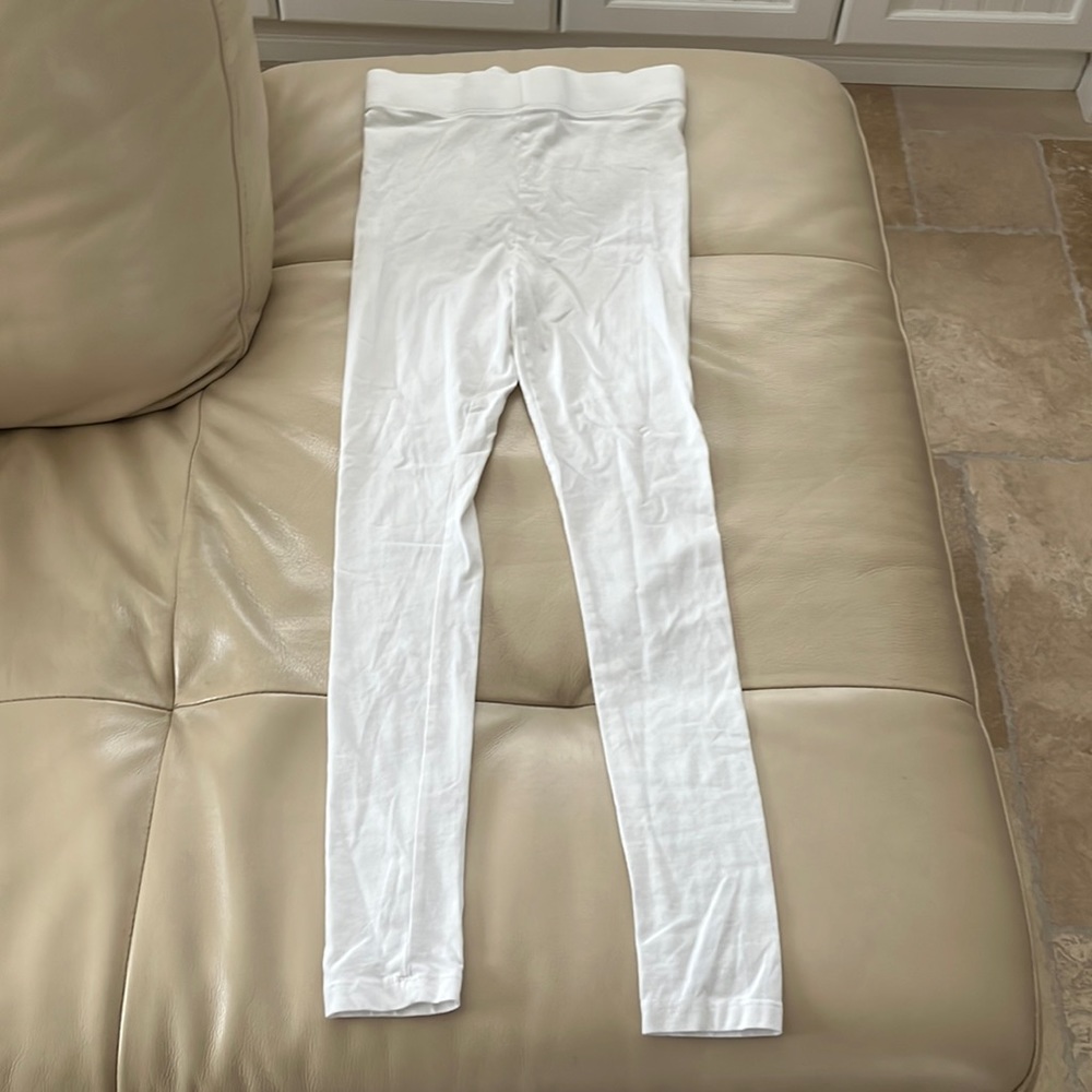 Women’s white leggings.